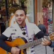 O Torgatto Cantando Nas Ruas De Santiago